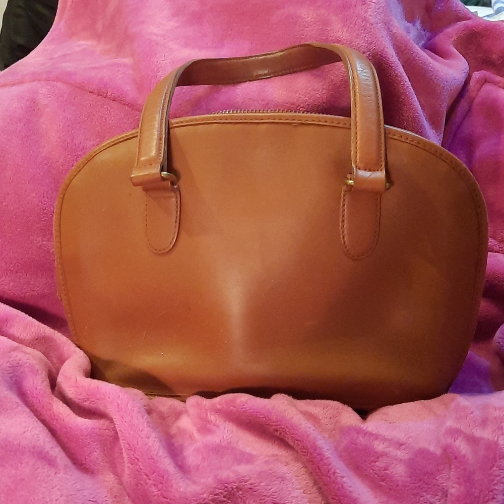 Tan leather hand bag.